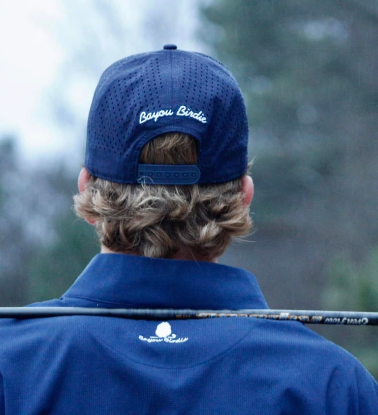 Navy Bayou Birdie Hat on Golfer