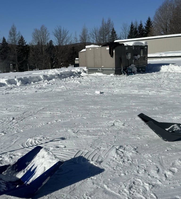 Flat roof snow removal