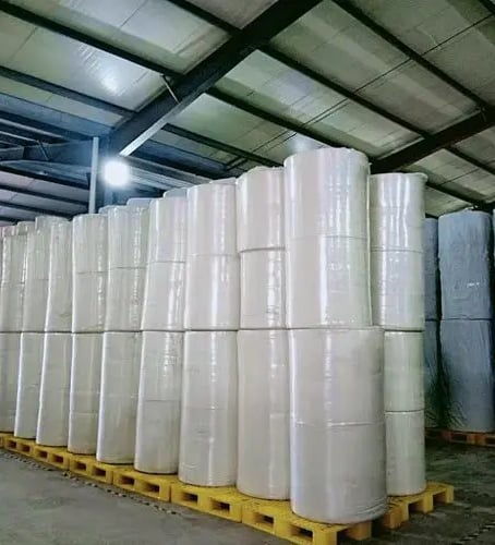 non-woven fabric rolls at warehouse