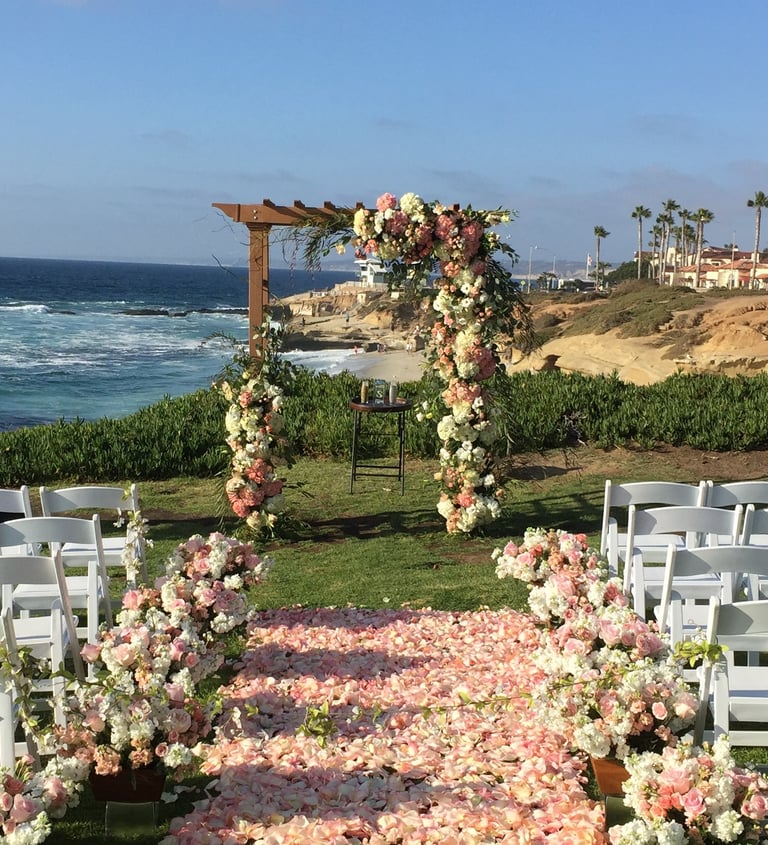 wedding florals at Cuvier park, the wedding bowl, la jolla with pink rose petal aisle