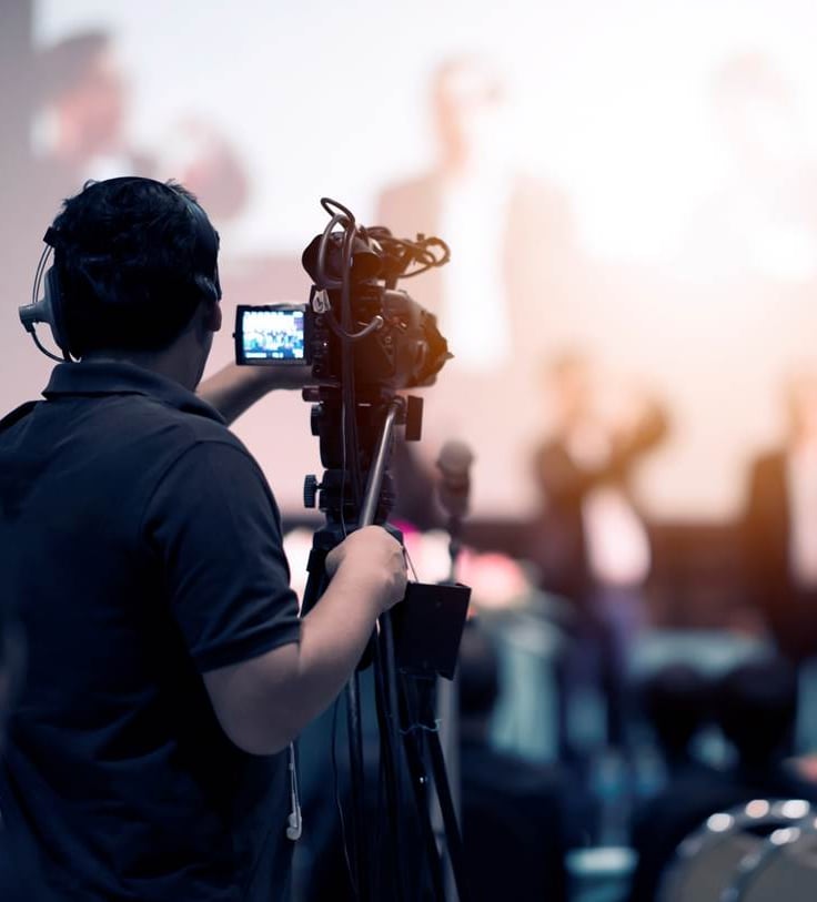 Videographer recording an event
