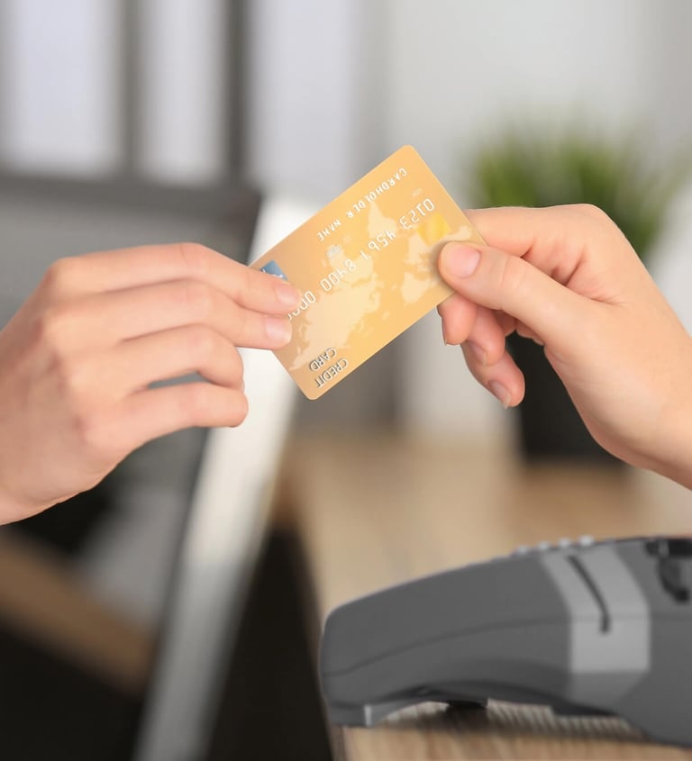 a person is paying with a credit card