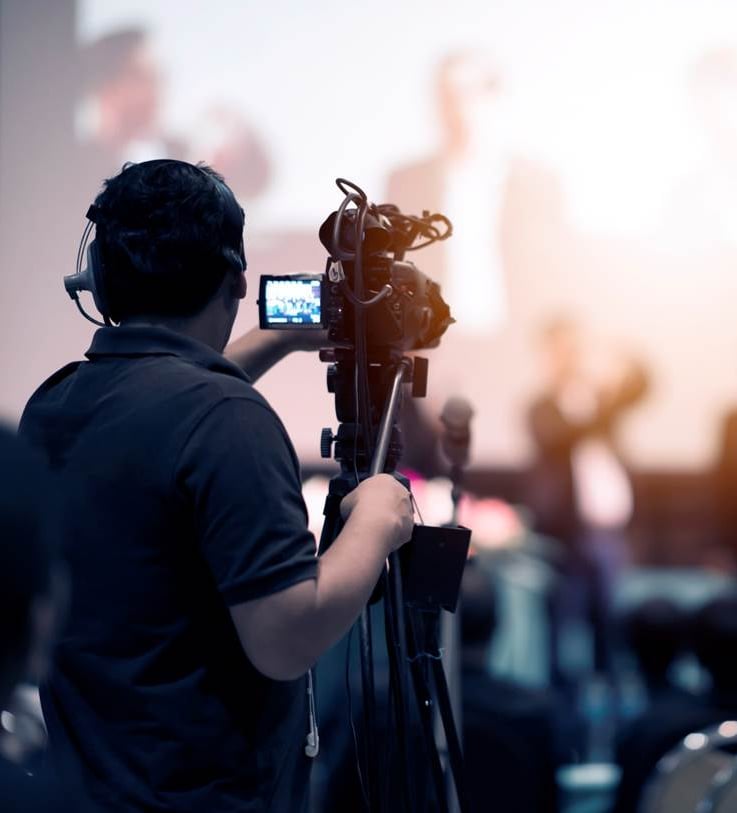 Videographer recording an event 