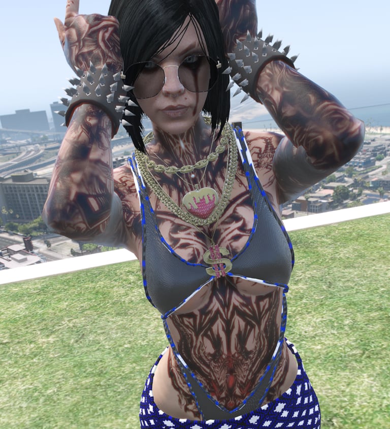 a woman with tattoos on her chest