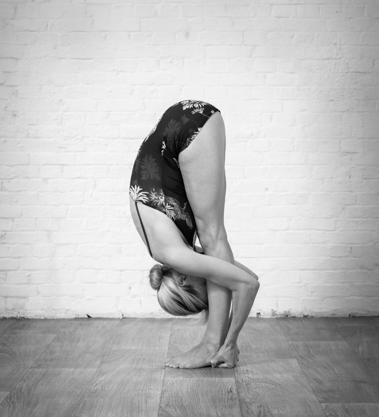 yoga teacher headtoknee pose asana