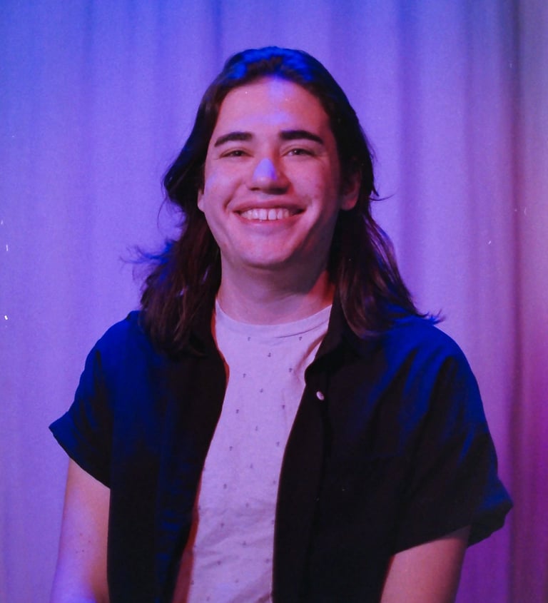 Sam Eads' headshot on Kodak Gold film