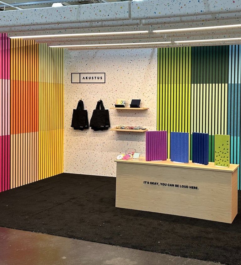 rainbow colored slatted madera acoustic panels AKUSTUS icff