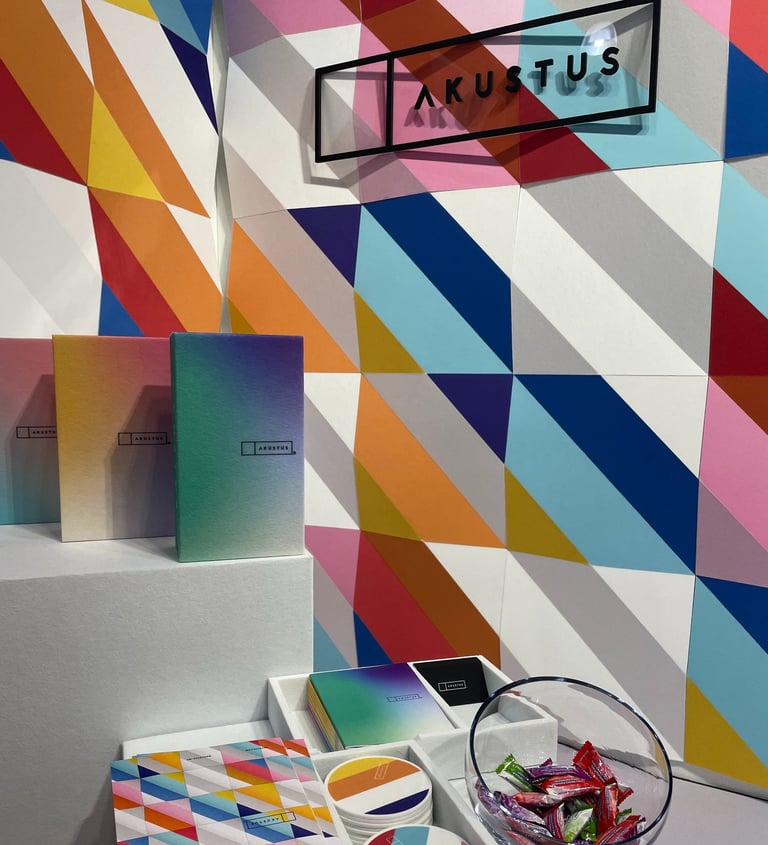 bright multicolored facets on 3D acoustic quartz wall panels by AKUSTUS at icff