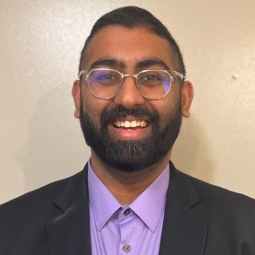 Headshot Picture of Dr. Ramakrishnan in a black blazer.