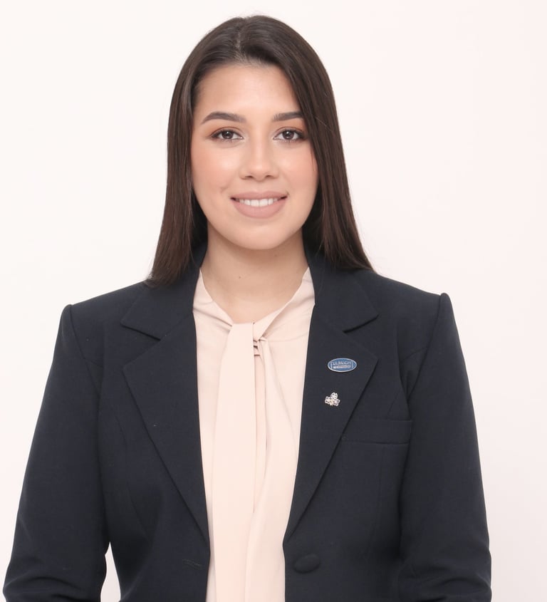 headshot of Betania Locatti Macereno in a black blazer