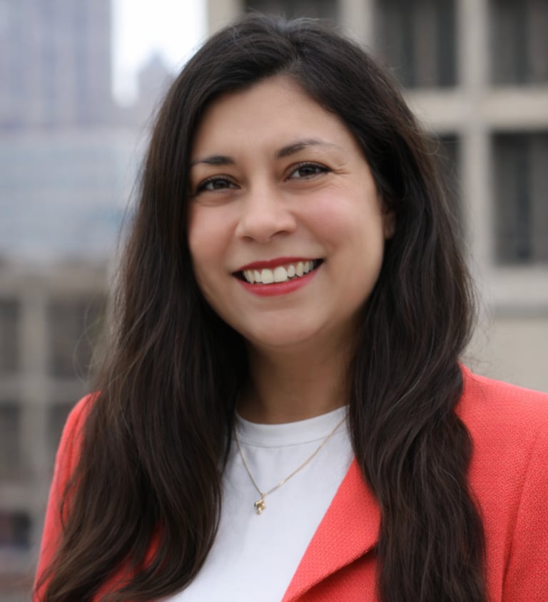 Headshot of Elizabeth Cambray-Engstrom in a red blazer