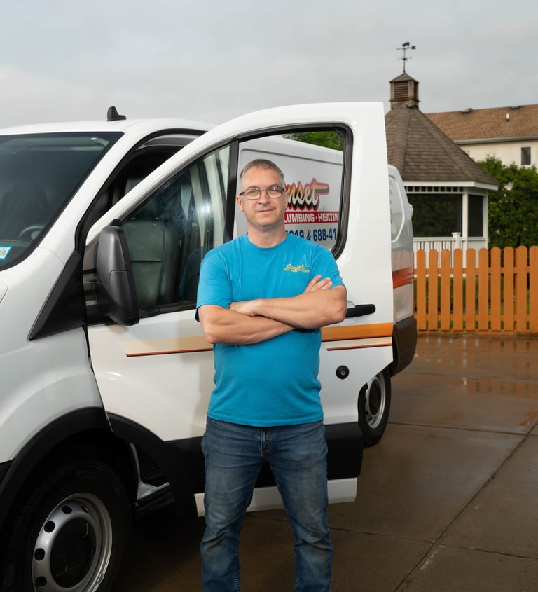 Dave standing in front of a service truck