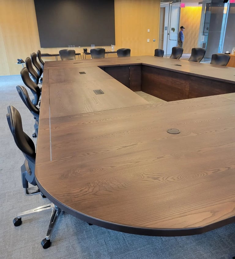 Custom white ash conference table — satin hardwax oil finish and grain surface detail