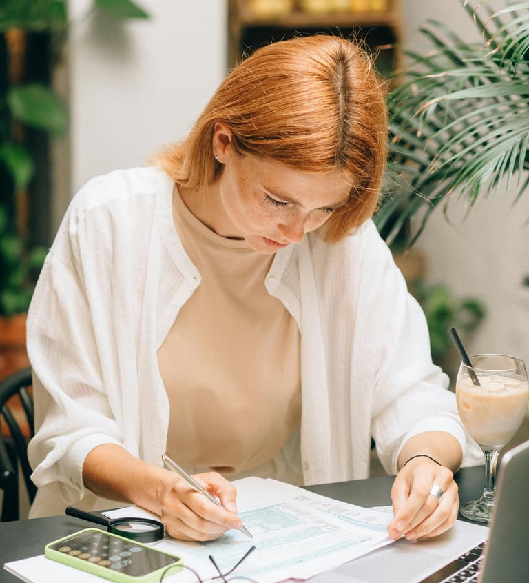 Image of a researcher writing a scientific paper