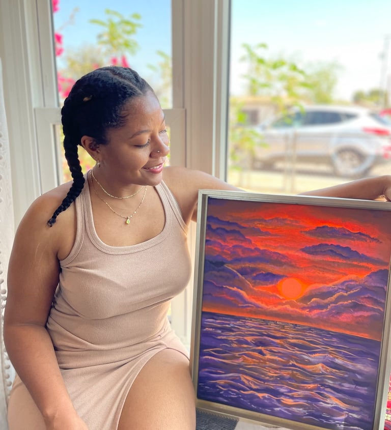 Alexis Peralta and an Arizona themed sunset paining