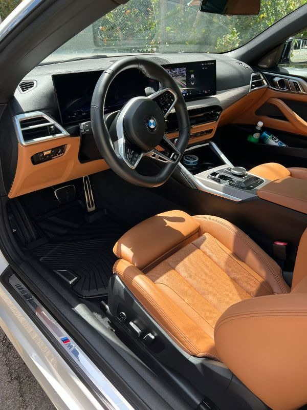 Immaculate interior of a luxury BMW after professional interior detailing service in Miami.