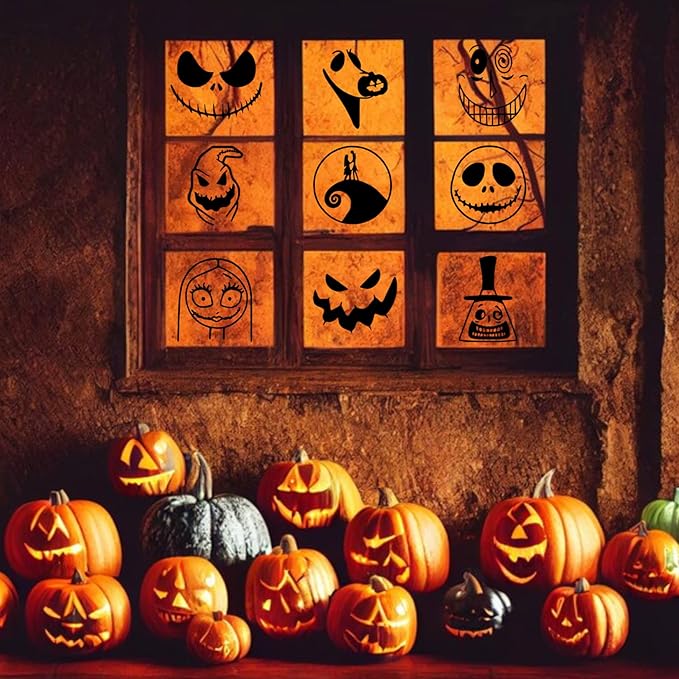 Halloween display featuring a row of glowing carved pumpkins on the ground in front of a rustic wind