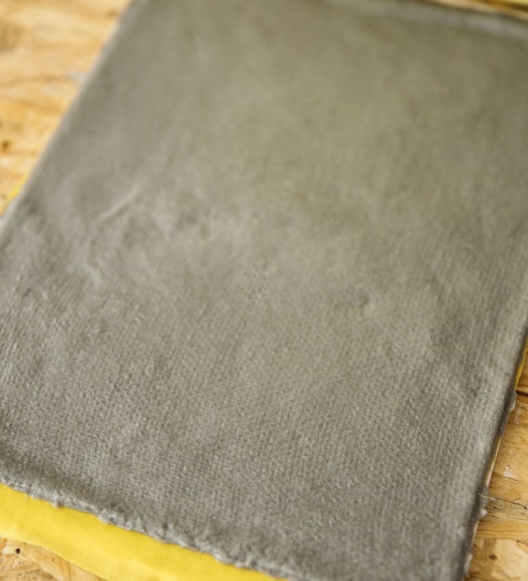 a piece of cloth with a book on it