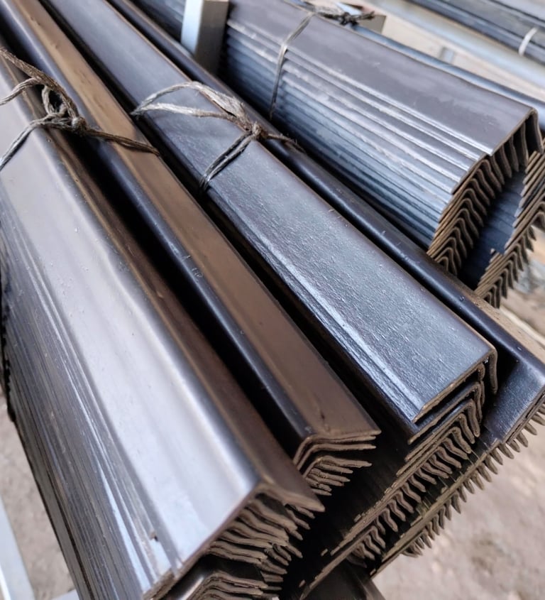 a bunch of metal pipes and pipes are stacked on top of each other