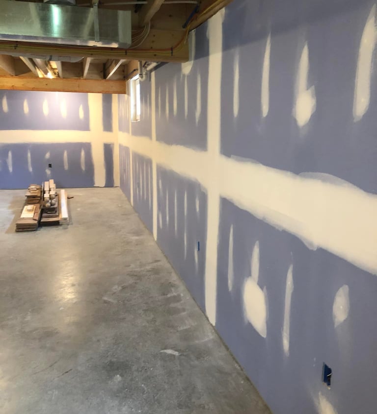 new blue drywall on basement walls