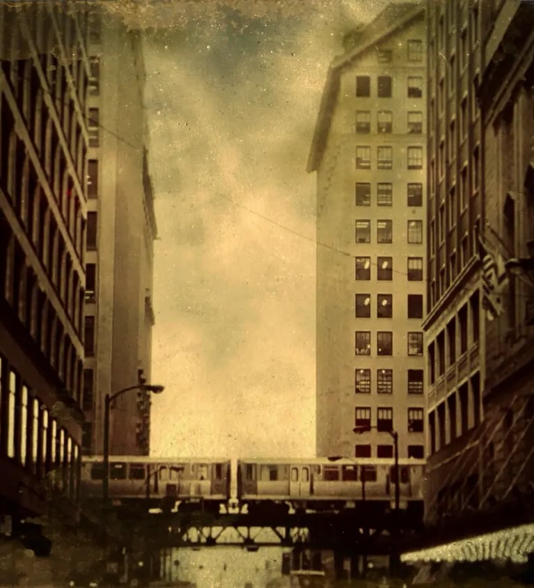 An old fashioned city street in Chicago, showcasing a train on its tracks