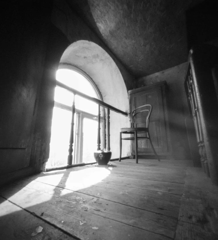 Sunlight-filled space with chair and window