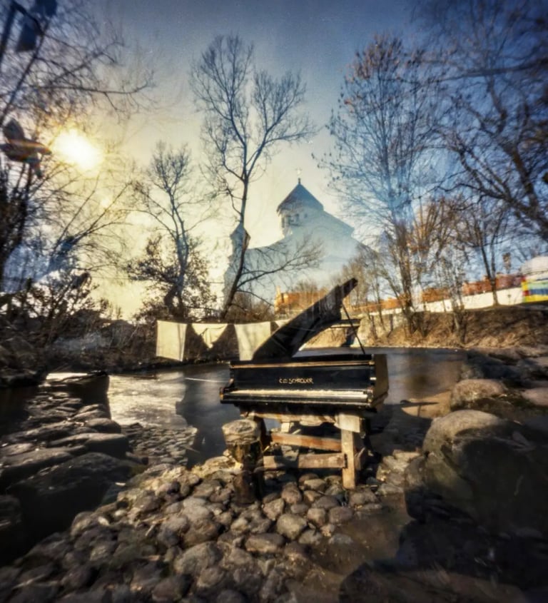 Opened piano standing near the river