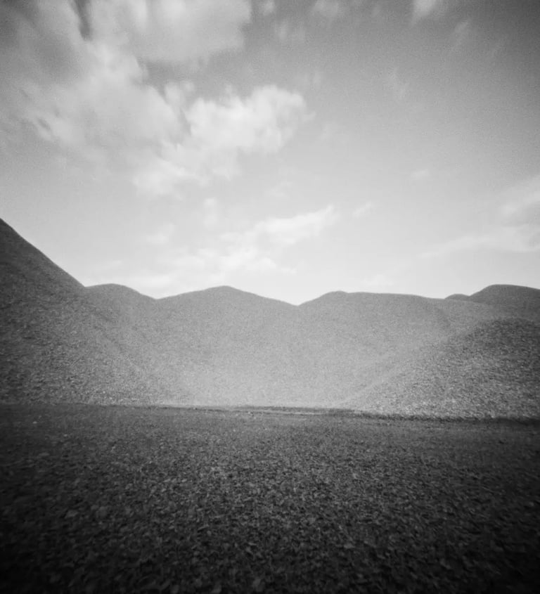 Black and white pinhole picture of mountains