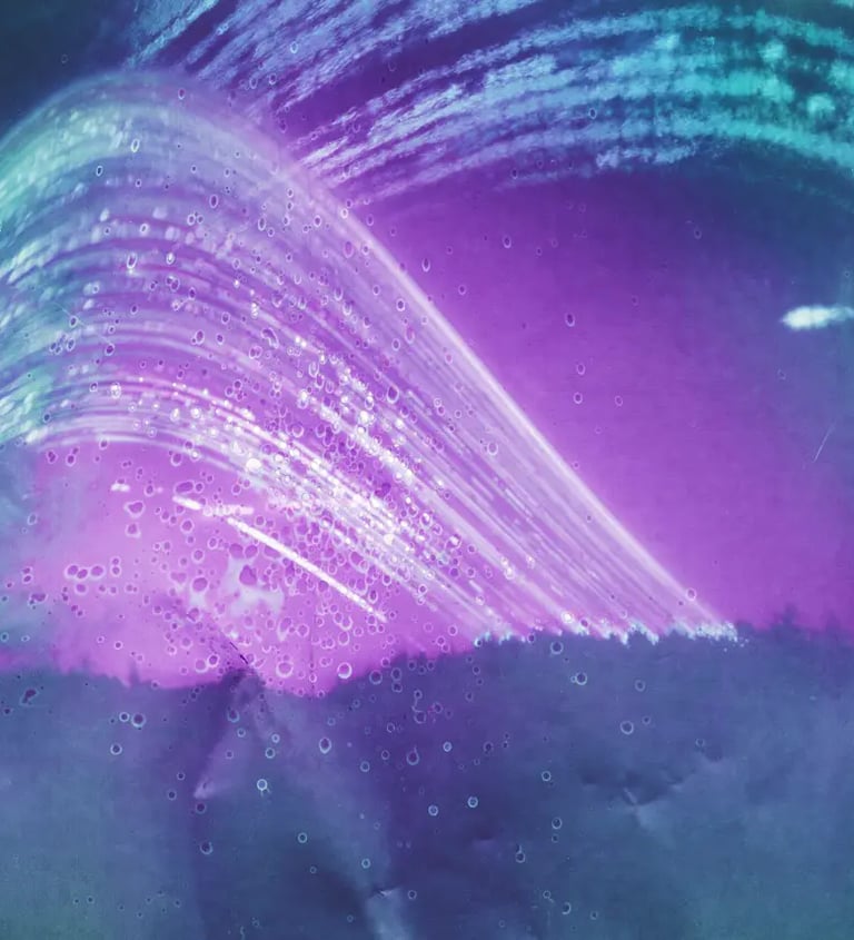 A vibrant purple and green wave against a serene blue background