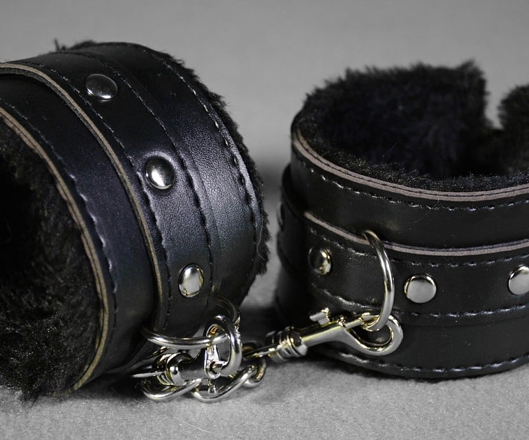black lined cuffs for bdsm play
