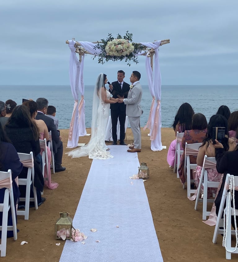 wedding ceremony at Sunset Cliffs at Osprey Point