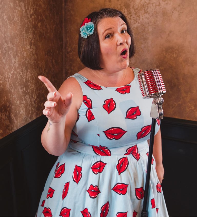 a woman in a dress with lipstick lips on her lips