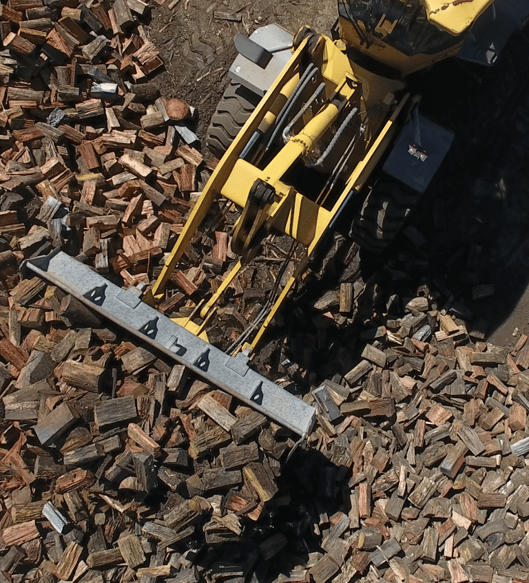 Loader bucket with firewood