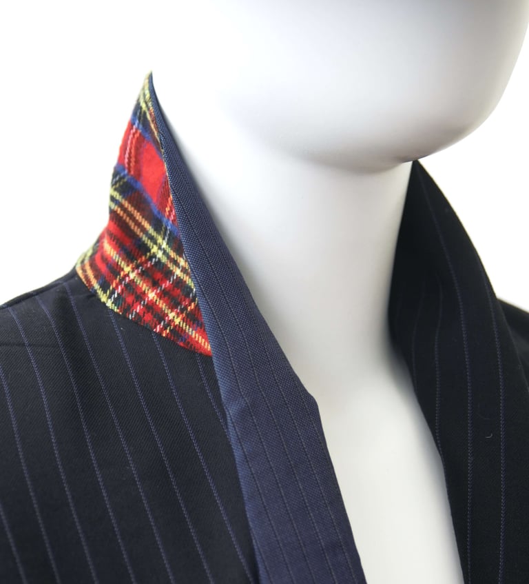 Tartan accents on collar of upcycled jacket