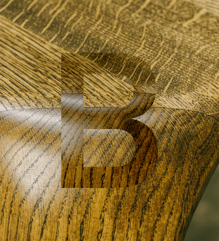 Close-up of solid Oak tabletop with natural finish, custom-made for B2B furniture project.