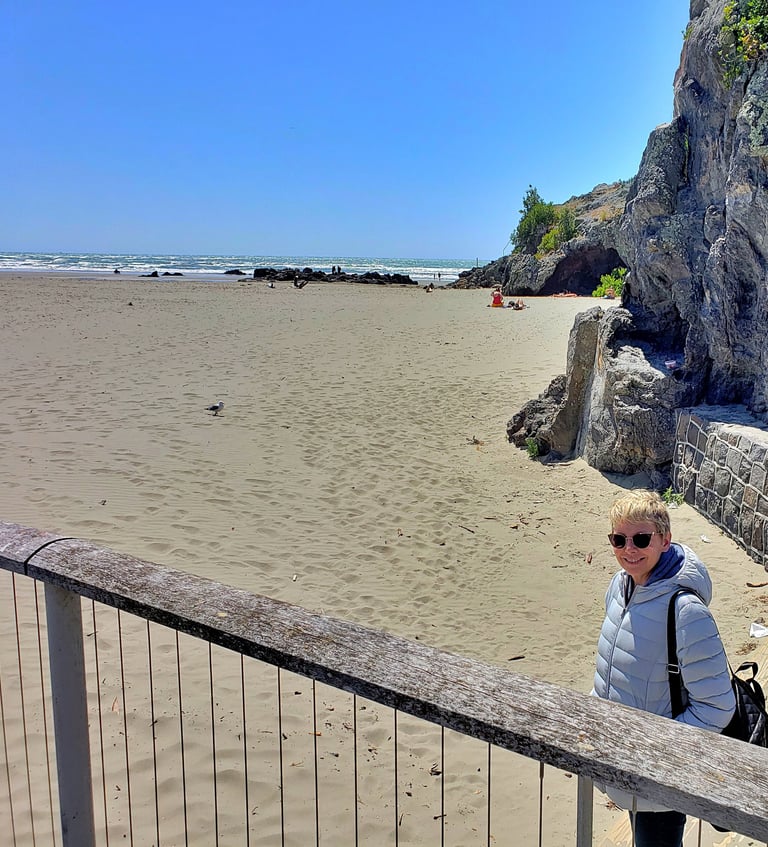 Lady Michelle enjoys a beautiful day at Sumner Beach in Christchurch, New Zealand