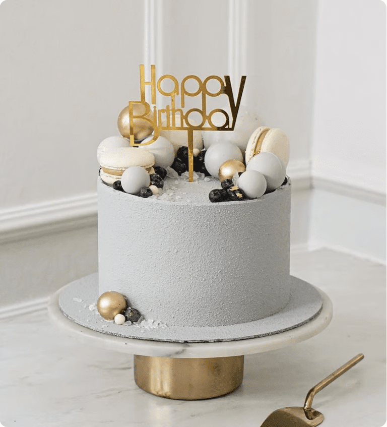 a cake with a happy birthday sign on top of it
