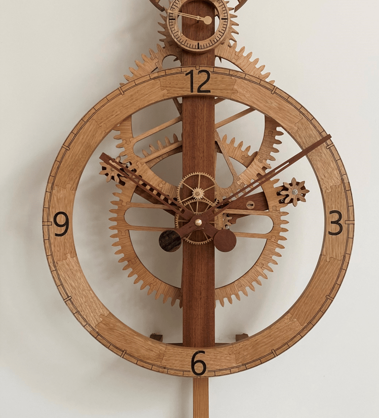 A wooden clock made from recycled timber. Wooden gears. Jigsaw joints. Reclaimed