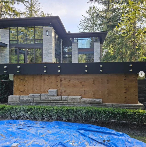 a house with a large backyard patio with a large backyard area