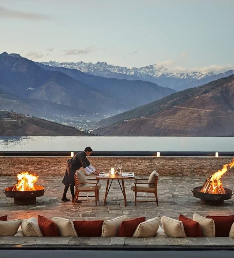 Six_Senses_Thimphu_Lodge_outdoor_dining_with_the_view_of_snow_capped_mountain_at_the_backdrop