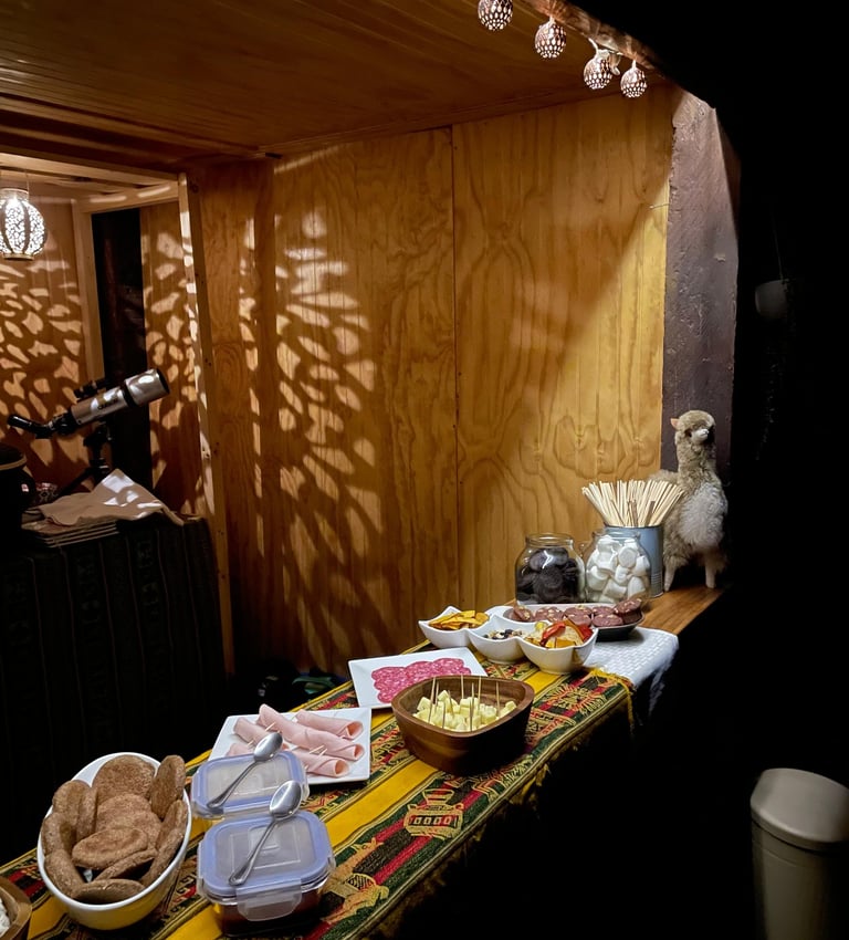 a table with a table cloth covered in food