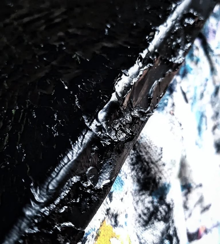 a close up of a black and white umbrella