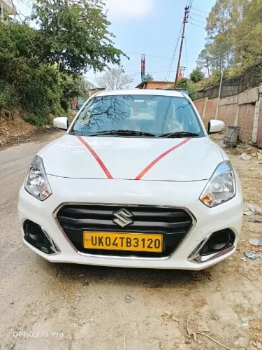 Kuamoni tour & travels Dzire Taxi