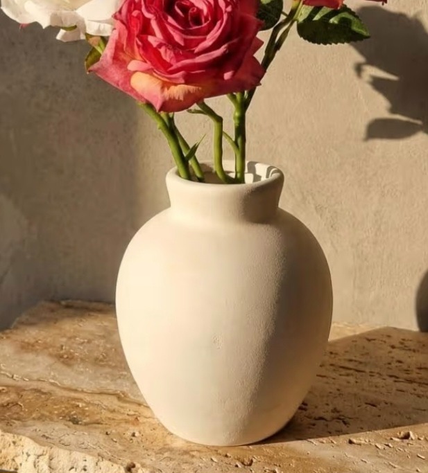 Round beige ceramic bud vase