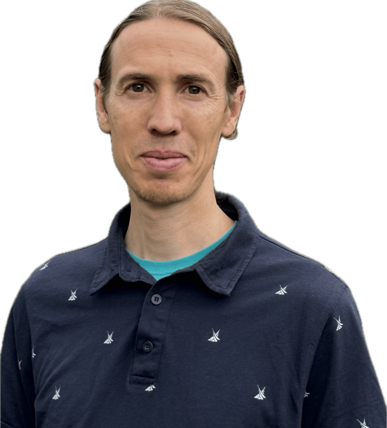 Image of Coach Chris looking at camera