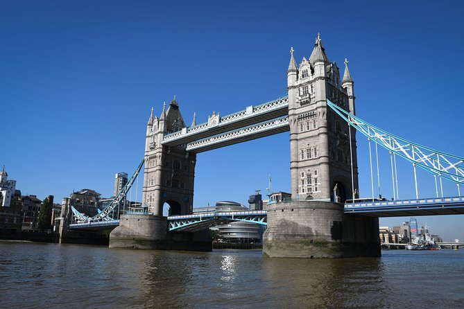 a bridge spanning the river with a bridge in the background corporasti