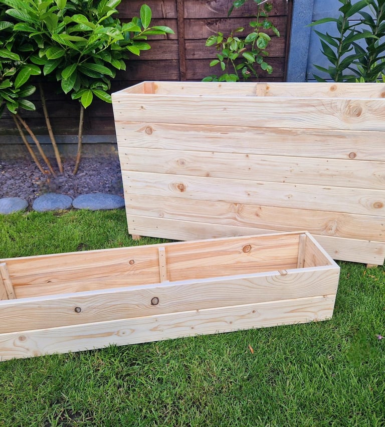 quality planters and plant boxes made from solid wood handmade in uk large and tall wooden troughs