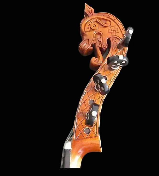 The head of a hardanger violin shaped like a dragon
