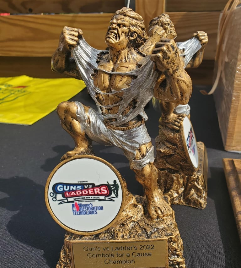 Guns vs Ladders Cornhole trophy