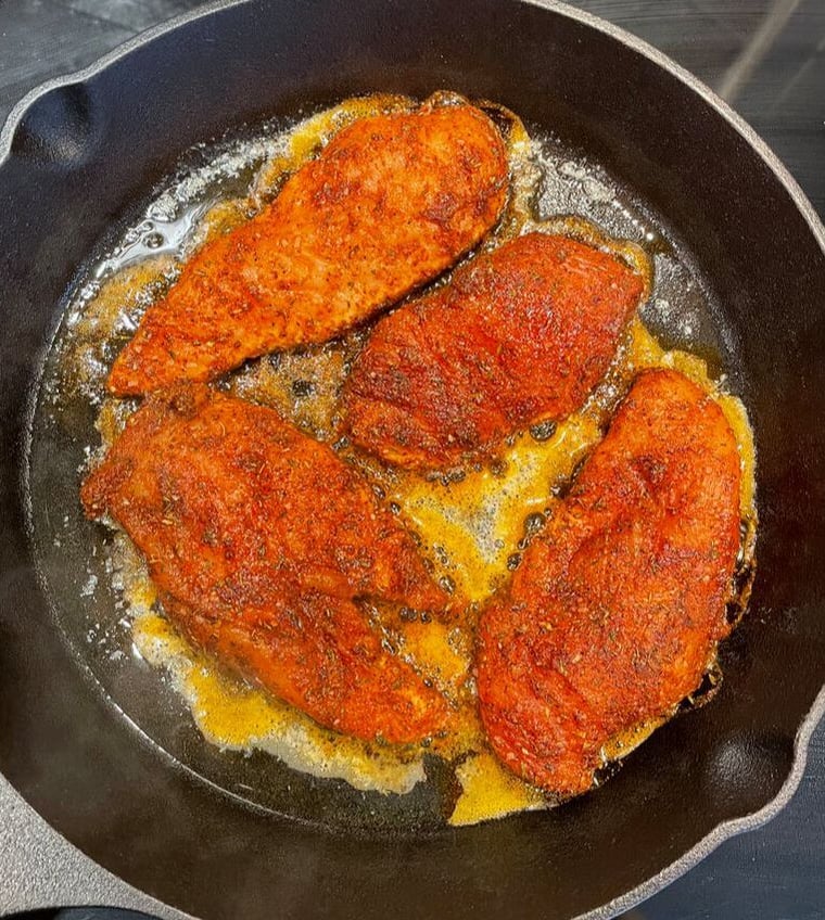 chicken with blackening spice cooking